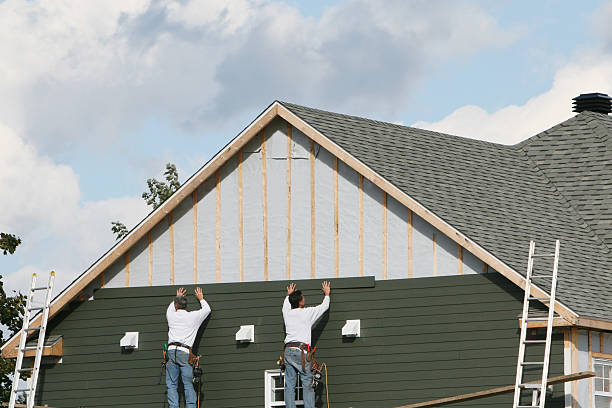 Professional Siding technician working in Conover, OH